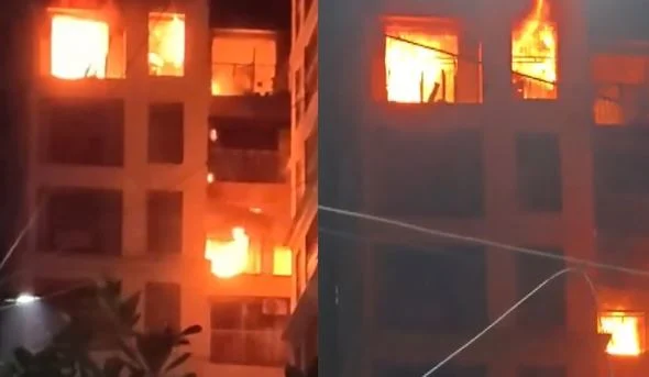 नालासोपारा की हाईराइज में भीषण आग: जान बचाने के लिए बाहरी हिस्सों पर लटके लोग, क्रेन से रेस्क्यू, 1 की मौत